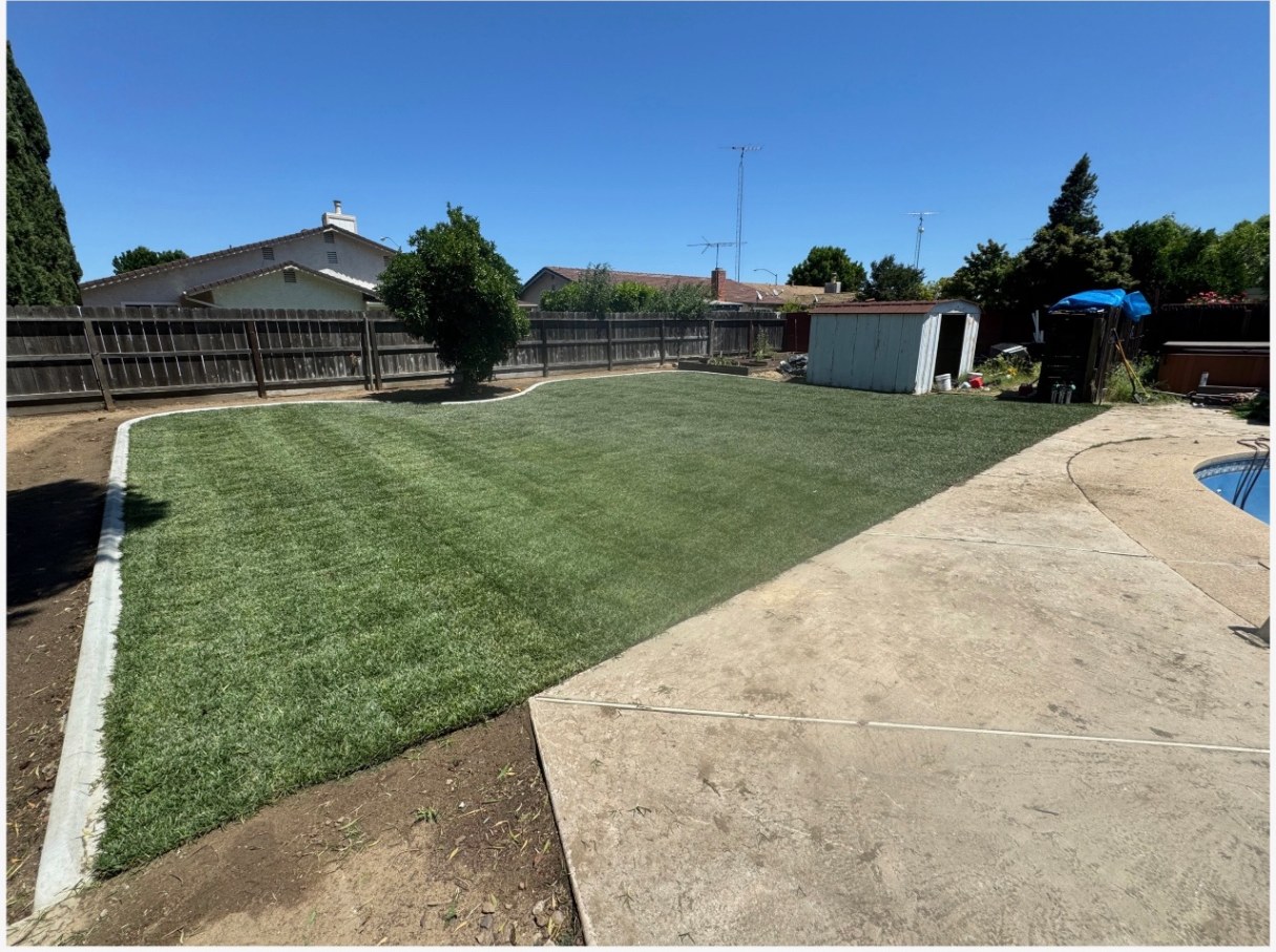 Backyard artificial turf installation — after